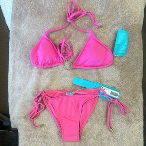 bikini in pink by Mellissa Odabash in size 4. side tie bottom, back/neck tie top